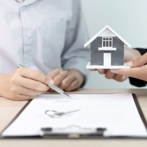 signing paperwork for a home